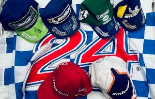 Driver-Worn Le Mans Podium Caps vs Standard Signed Merchandise
