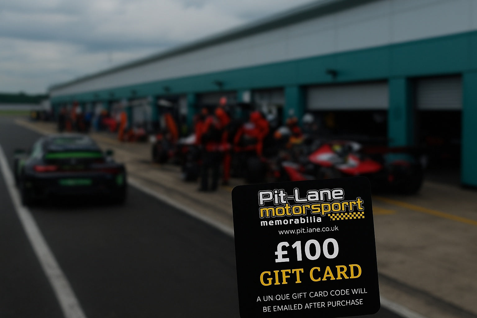 Pit-Lane Motorsport Gift Card displayed over a dynamic motorsport pit-lane scene