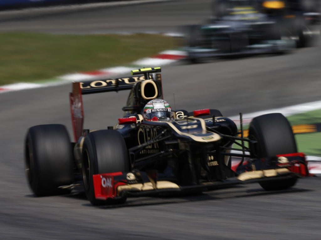 2012 Jerome D' Ambrosio Lotus Renault F1 Team Race Used OMP Nomex