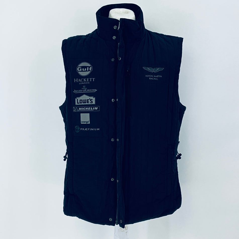 Navy blue vest with brand logos on a white background