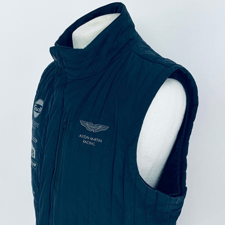 Navy blue vest with branding on a white background