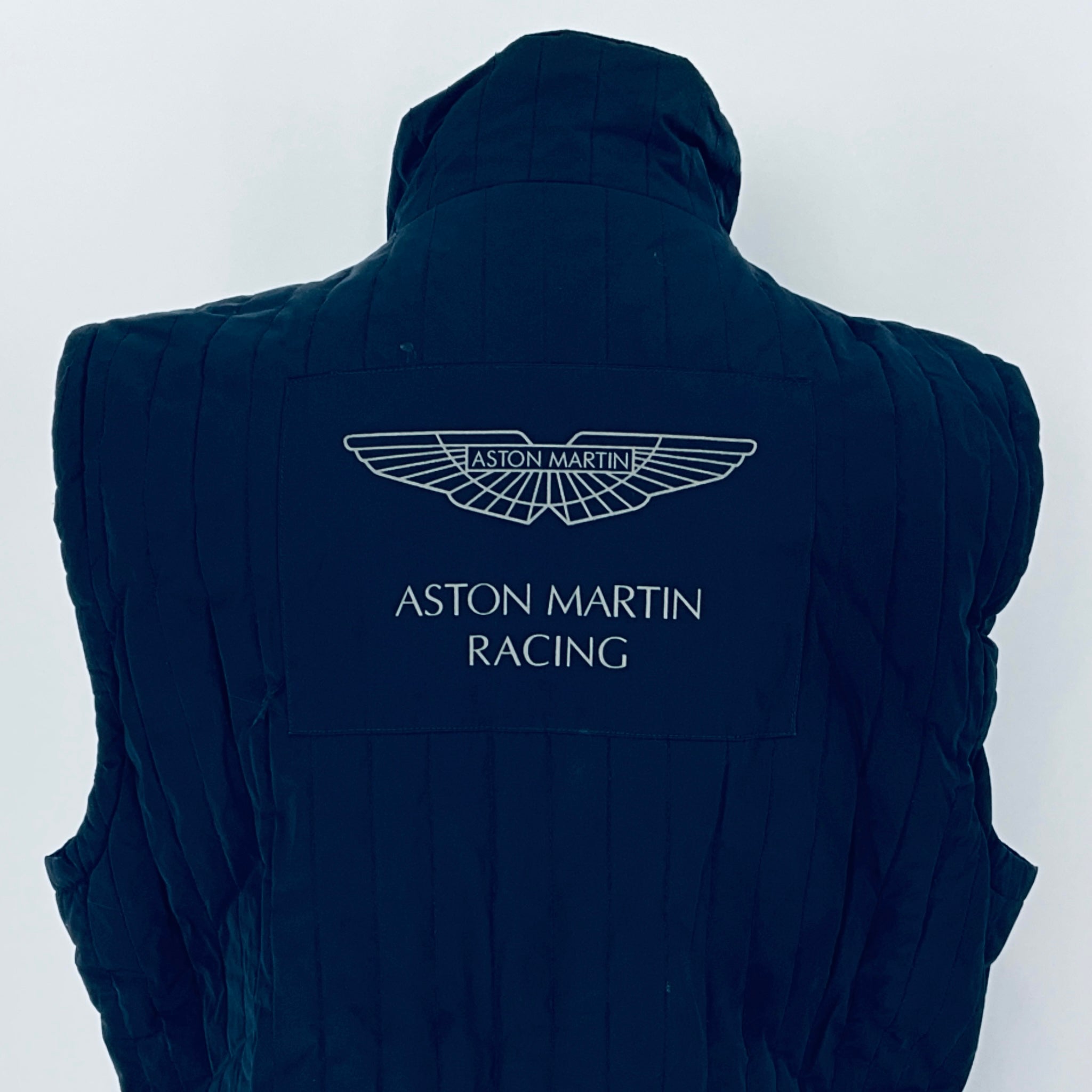 Navy blue vest with Aston Martin Racing logo on a white background