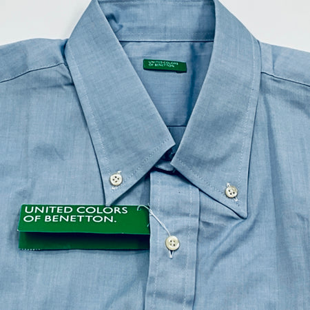 Blue shirt with 'United Colors of Benetton' tag on a white background