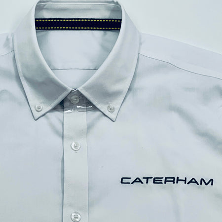 Light gray shirt with 'Caterham' logo on a white background