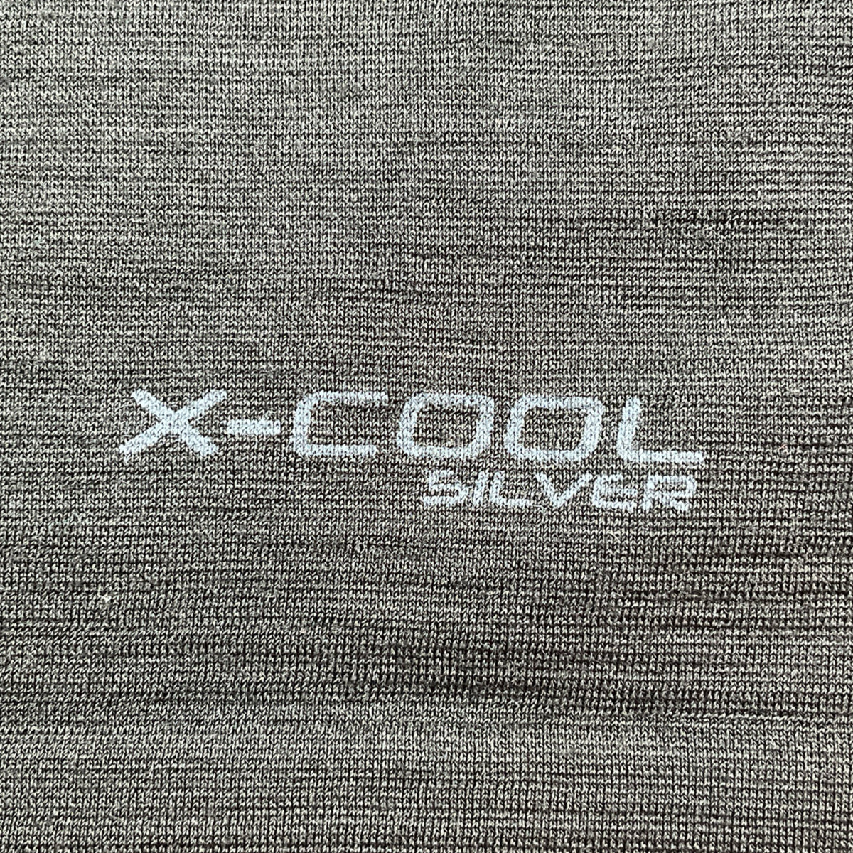 Text 'X-COOL SILVER' on a textured gray background