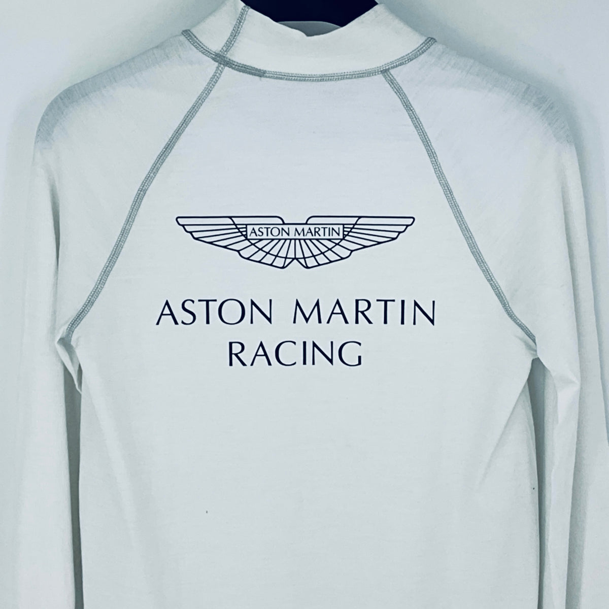 White wetsuit with Aston Martin Racing logo on a white background