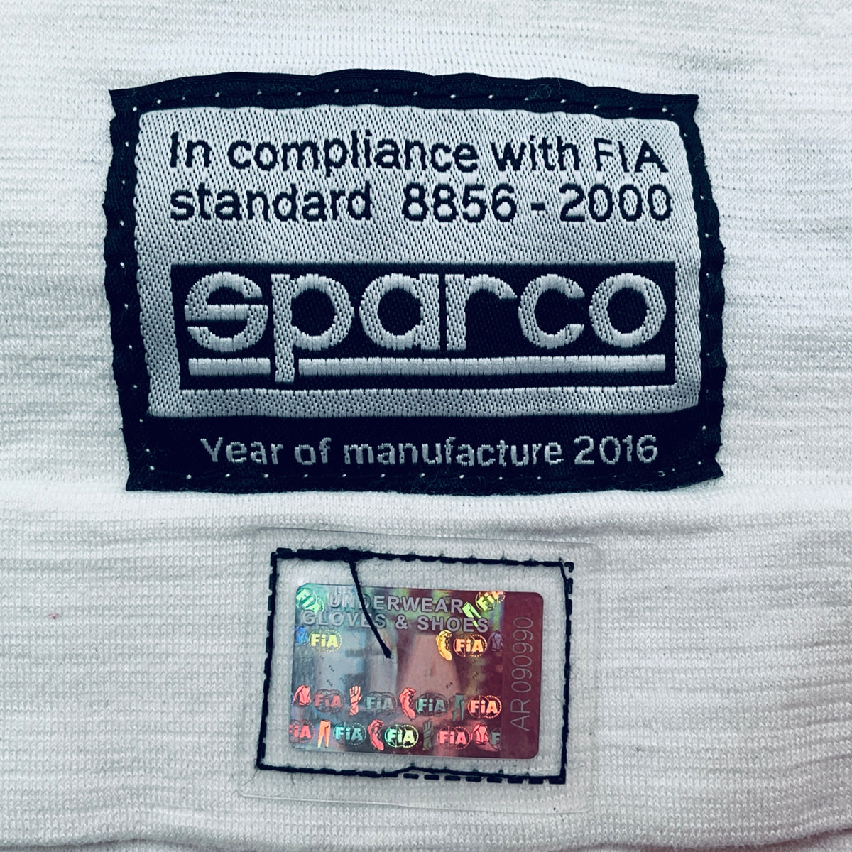 Sparco label on a white background with compliance text and logo.