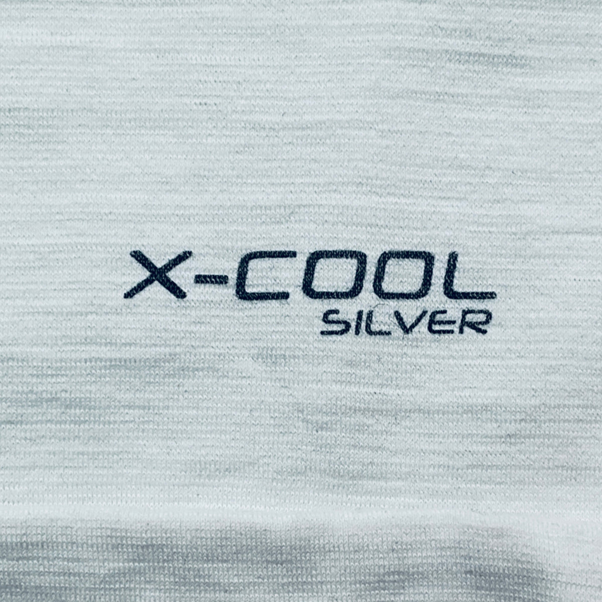 Text 'X-Cool Silver' on a textured gray background