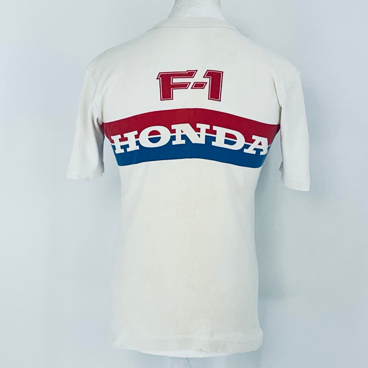 White shirt with 'F-1 Honda' logo on a white background