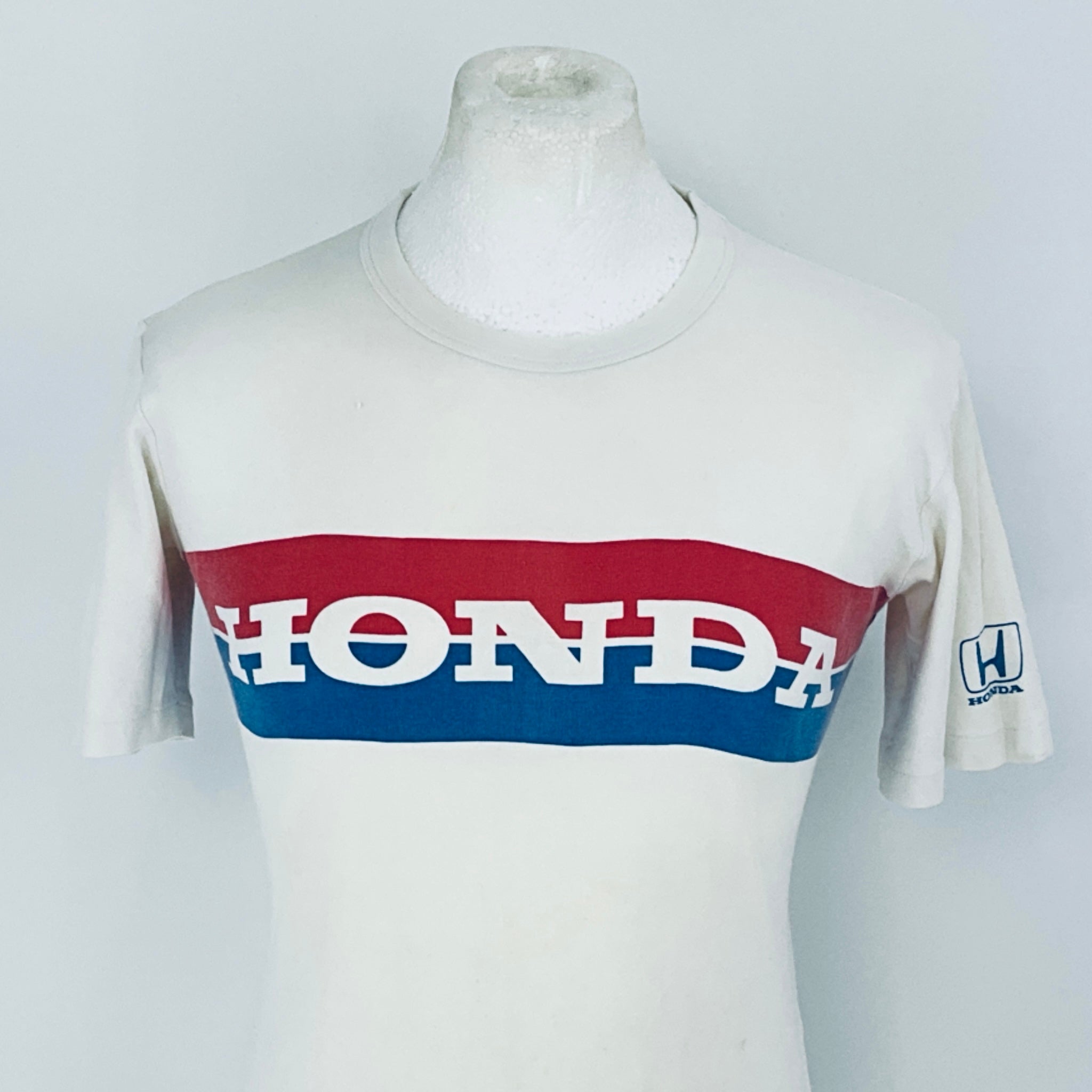 White t-shirt with Honda logo on a mannequin against a white background