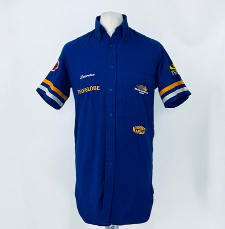 Blue short-sleeve button-up racing shirt with striped sleeve cuffs and logo patches