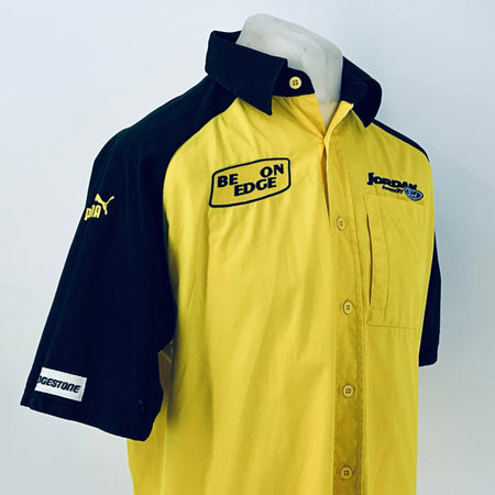 Two-tone short-sleeve button-up shirt, front view with Be On Edge patch and chest logo