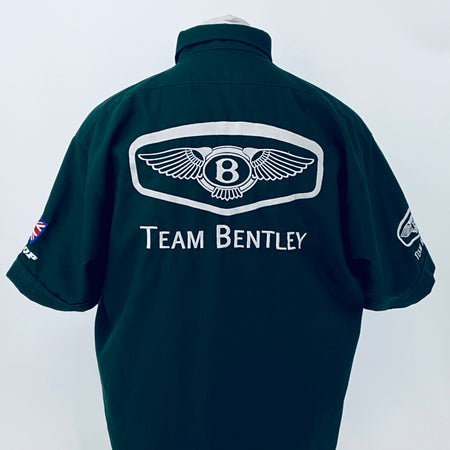 Dark teal polo shirt back with winged Bentley emblem and Team Bentley lettering