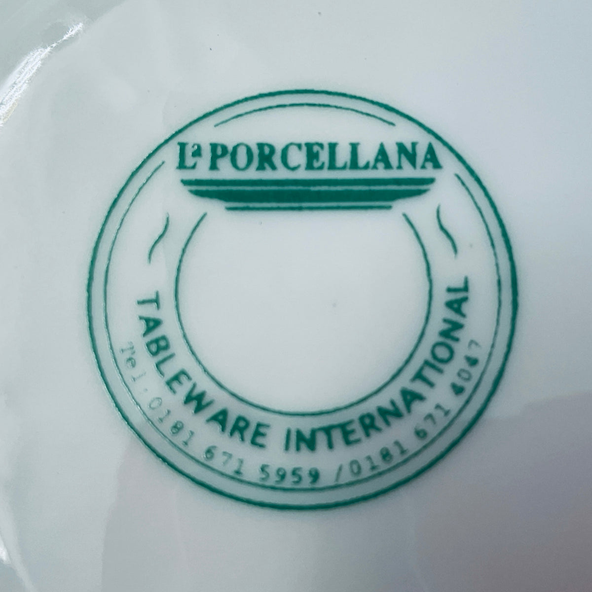 Green backstamp on porcelain base: L'PORCELLANA TABLEWARE INTERNATIONAL
