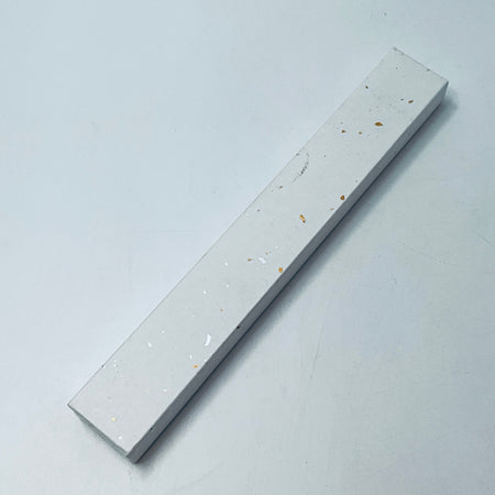 Slim gray gift box for folding fan, speckled with small gold and orange marks
