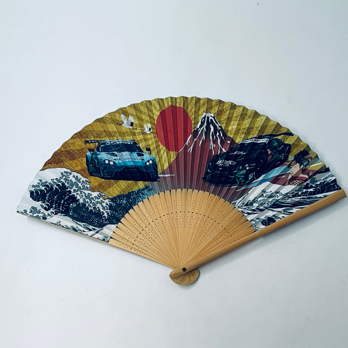 Decorative folding fan with wooden handle, mountain and wave print fan blades