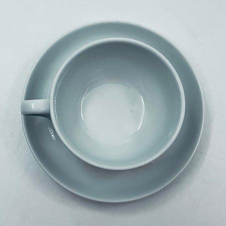 Light blue porcelain cup from above, open rim and interior