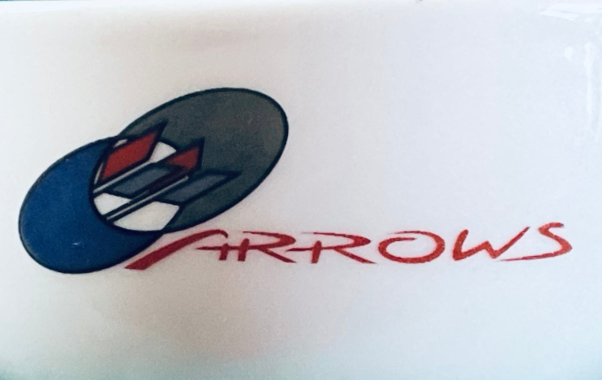 Close-up of ARROWS logo on light blue porcelain cup