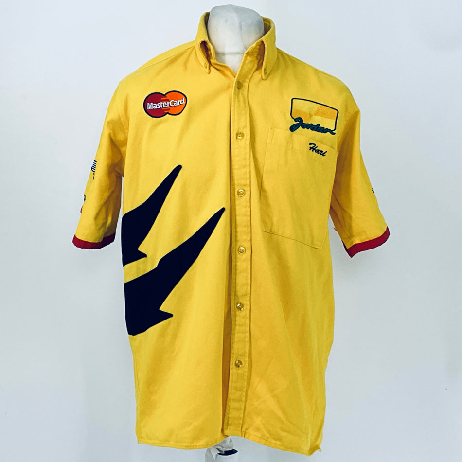 Yellow button-up racing shirt with collar, short sleeves, navy graphic, red trim cuffs