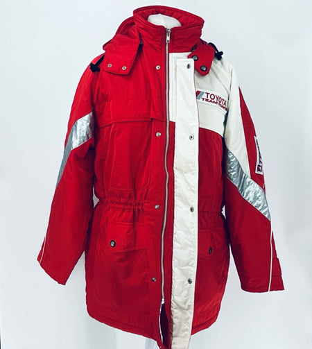 Red and white hooded winter parka with button front, zip closure, and logos