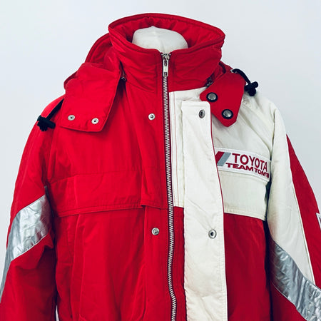 Red and white hooded parka with full-length zipper, button pockets, and Toyota patch