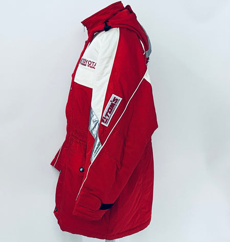 Red winter parka jacket with hood, off-white side panel, and sleeve logo patch