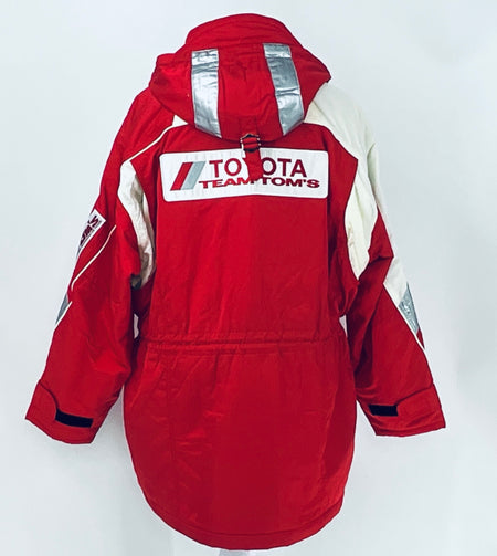 Red and off-white winter parka jacket with hood, back Team TOM'S logo, and rear patch details