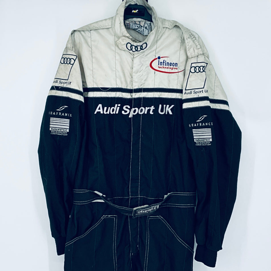 Two-tone Audi Sport UK racing coveralls with long sleeves, front zip, logos on chest and cuffs