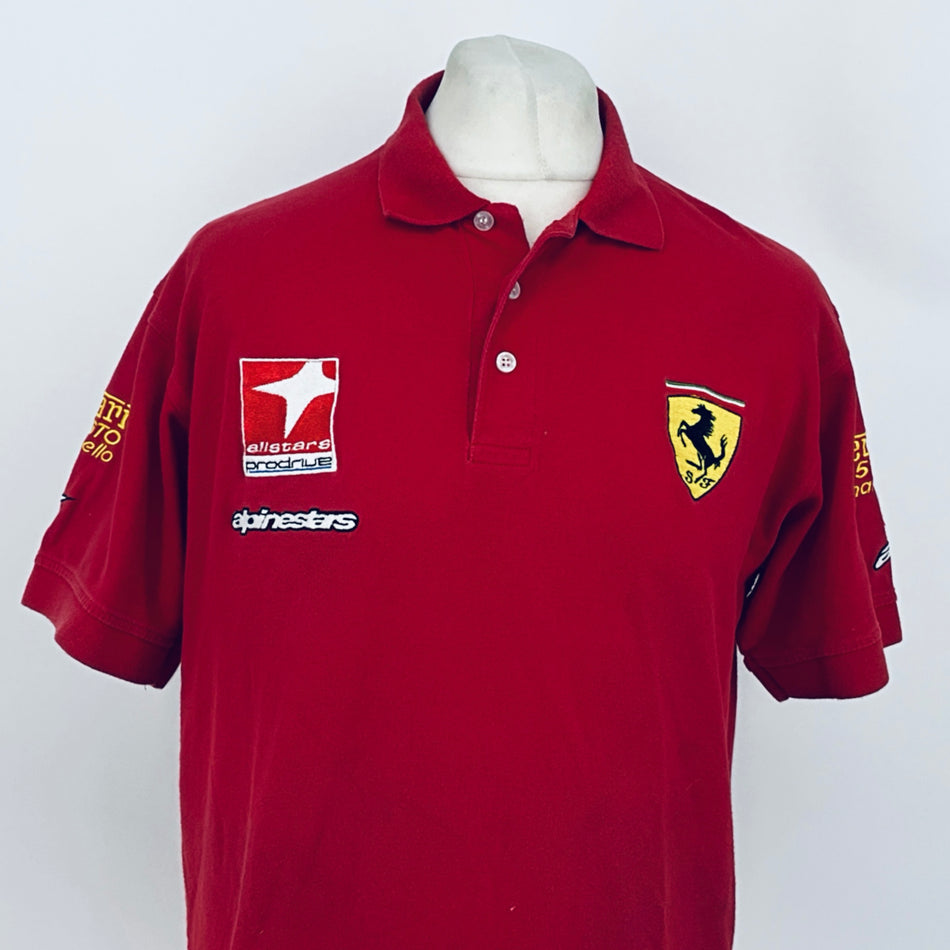 Red polo shirt with button collar, Alpinestars and Ferrari shield logos
