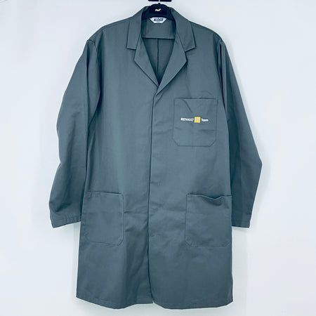 Teal workwear coat with lapels, button front, and chest logo patch