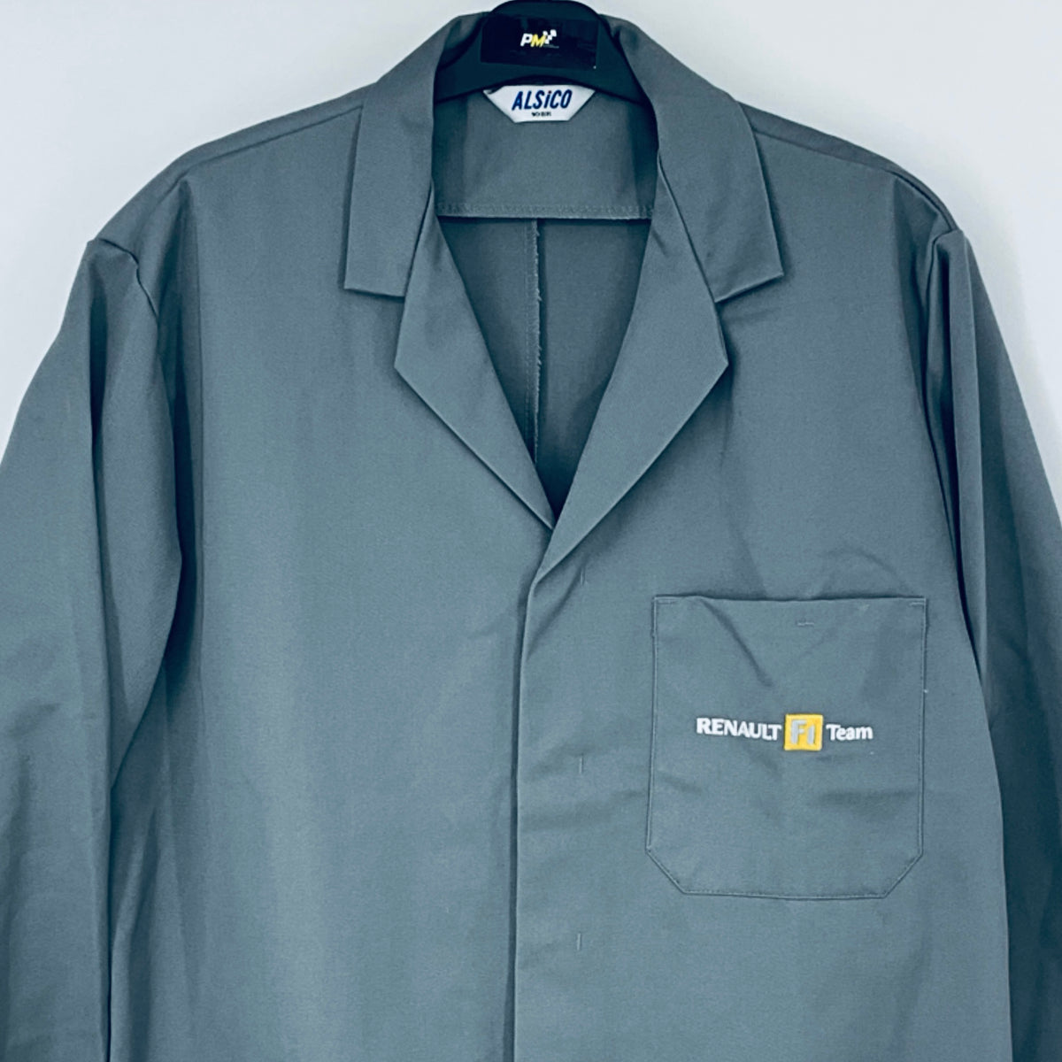 Teal workwear coat front with lapels and Renault F1 Team chest patch