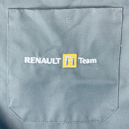 Renault F1 Team logo patch on teal chest pocket of workwear coat