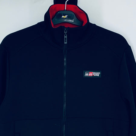 Dark navy full-zip sweatshirt with red-lined hood and GR logo badge on chest