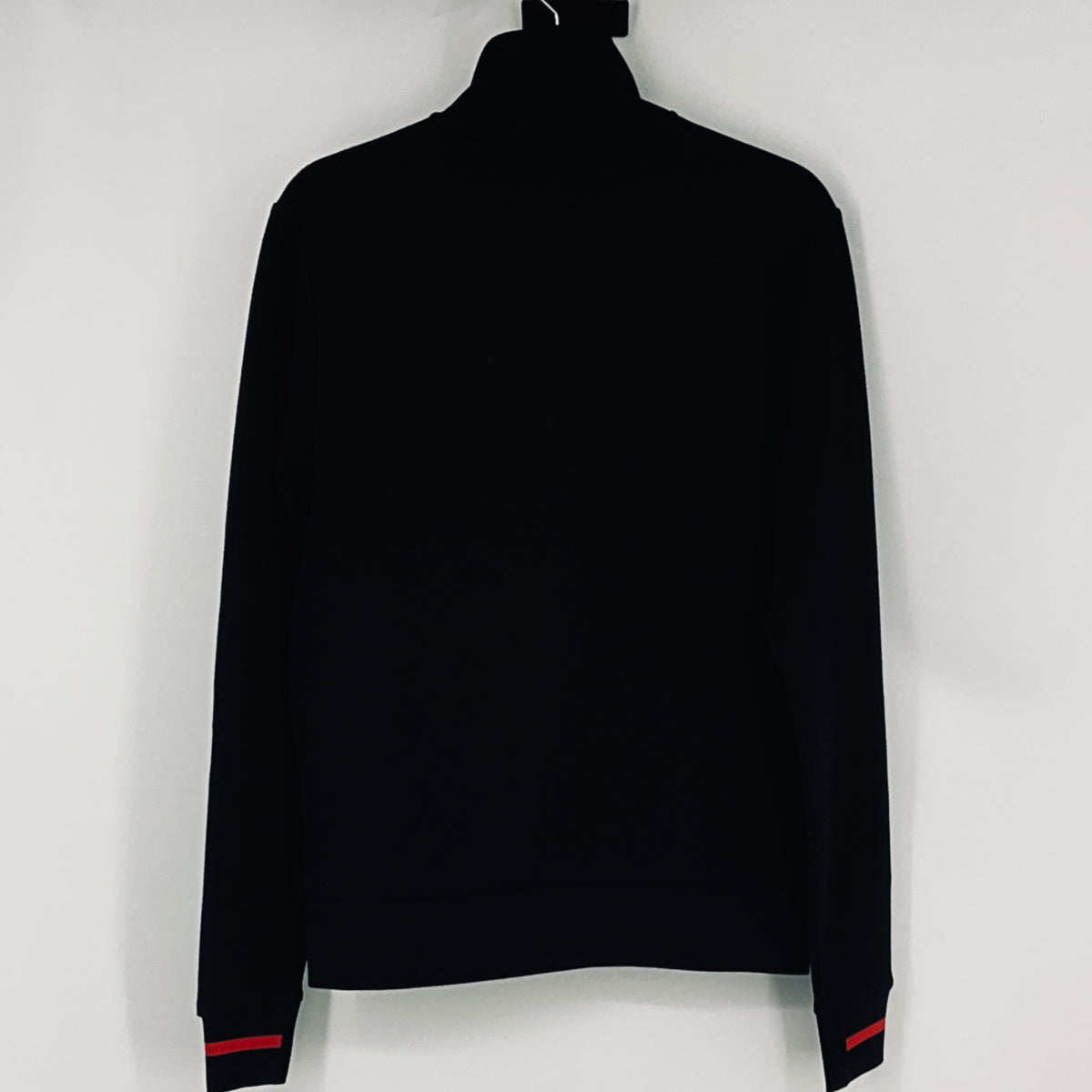 Dark navy full-zip sweatshirt with red cuff and hem stripe accents, plain back view