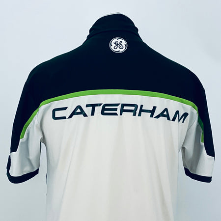 Team polo shirt back close-up: dark navy collar area with CATERHAM branding
