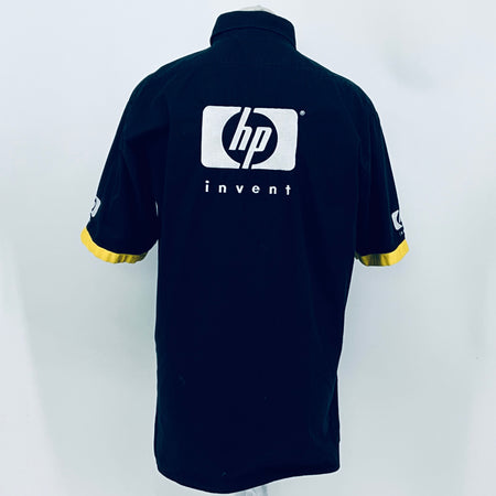 Dark blue team shirt back view with large hp invent logo and yellow sleeve cuffs