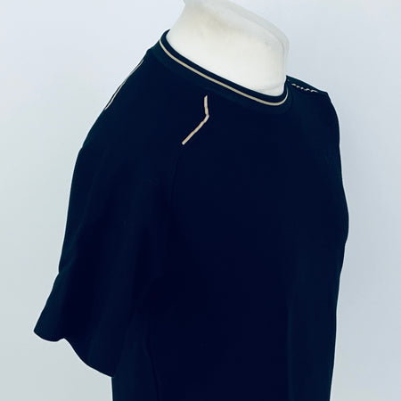 Dark navy crew-neck T-shirt with contrast collar trim and left chest Puma-style logo