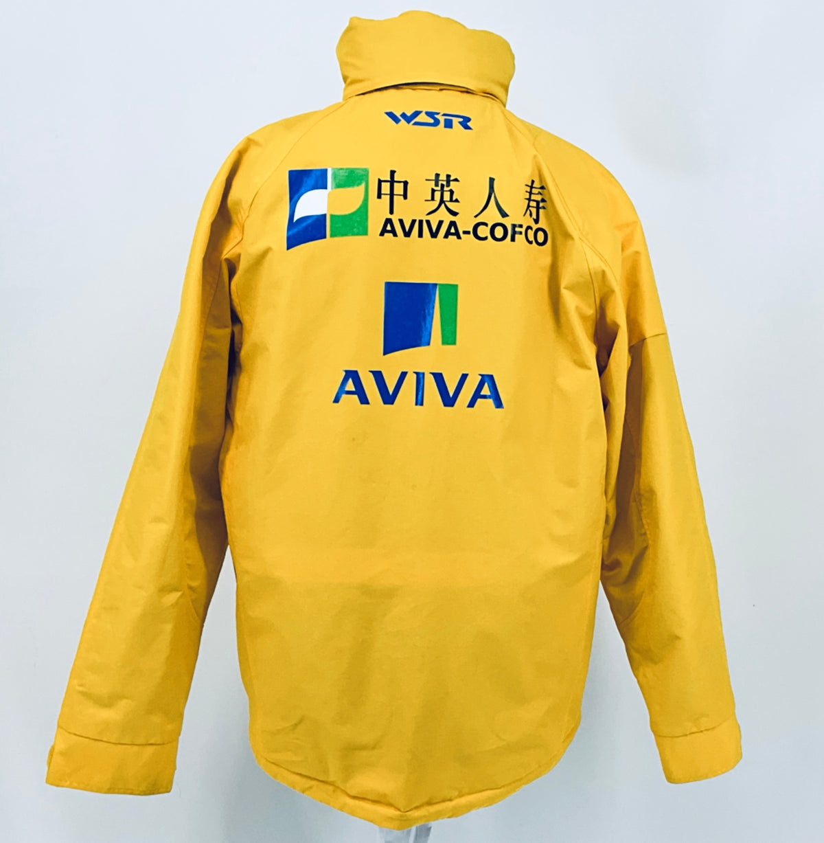 Yellow racing jacket back view with WSR logo and AVIVA-COFCO sponsor branding.