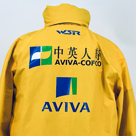 Yellow racing jacket close-up of back logos: WSR, AVIVA-COFCO, and AVIVA branding.