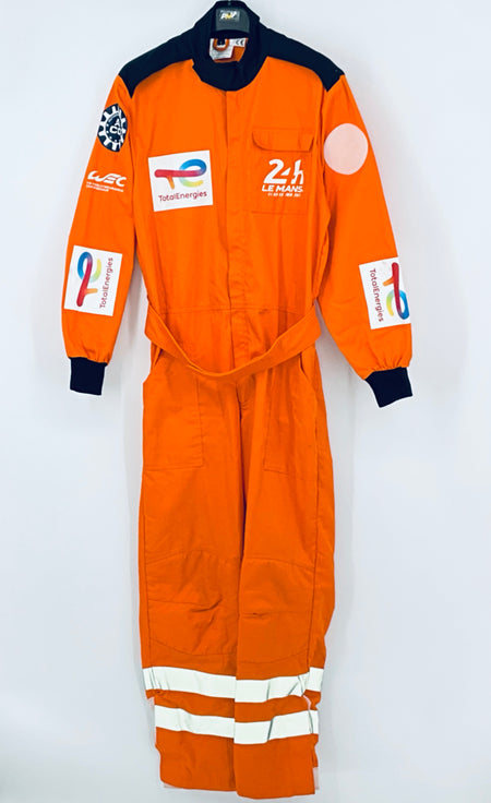 Orange race marshals overalls, navy cuffs, front logos, and reflective stripe trouser hem