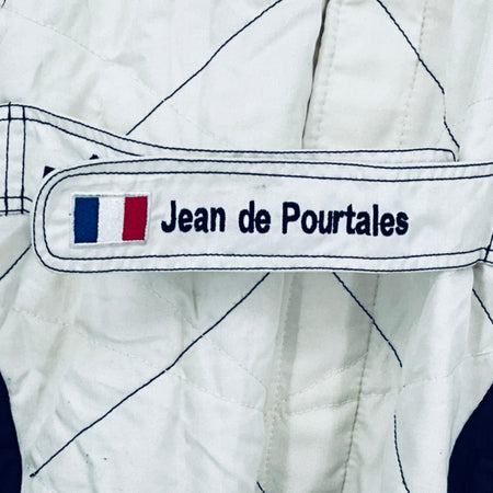 White race suit sleeve with Jean de Pourtalès name patch