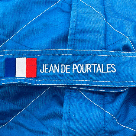 Blue racing suit sleeve with French flag and Jean de Pourtales name patch
