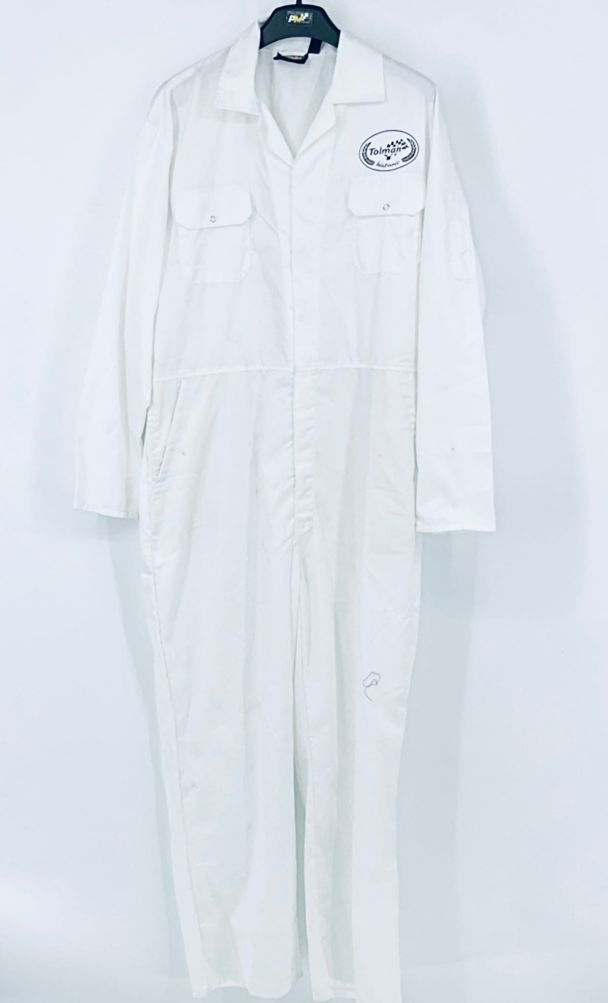 White one-piece racing overalls with chest pockets and button front