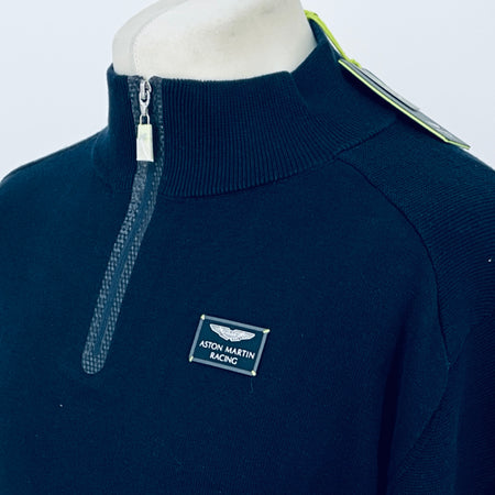 Navy quarter-zip sweater with silver zipper and small chest logo patch