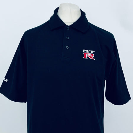 Black polo shirt with GT-R logo on chest, button-up collar, short sleeves