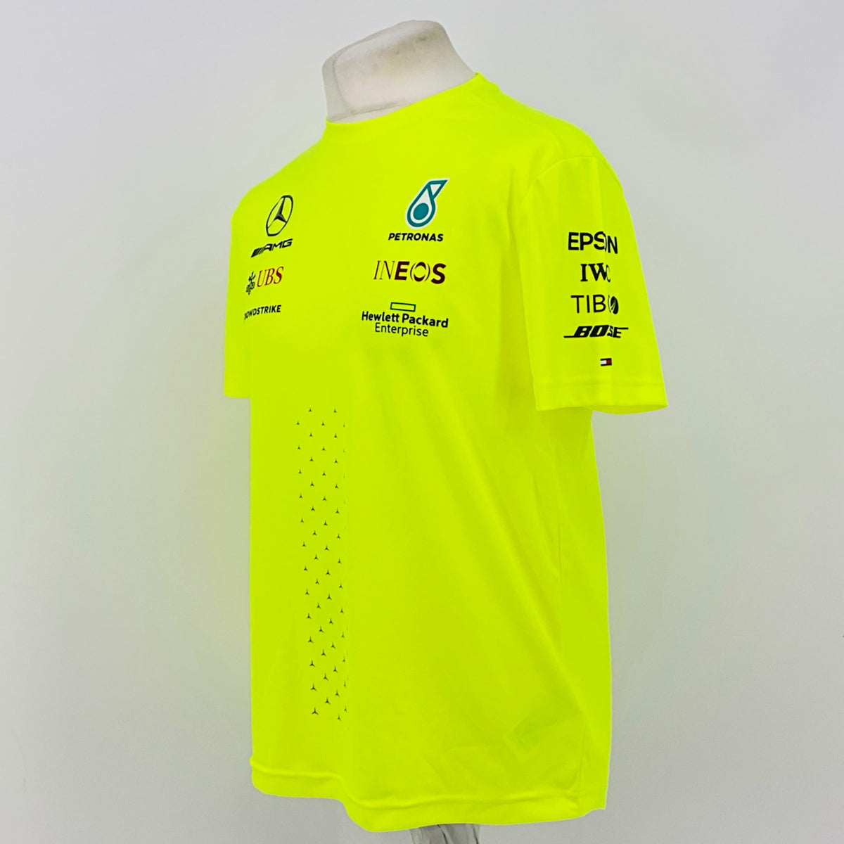 Neon yellow hi-vis T-shirt side view with sponsor logos on chest and right sleeve
