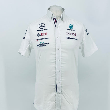 White button-front team shirt with Mercedes AMG, UBS, and Petronas Ineos logos