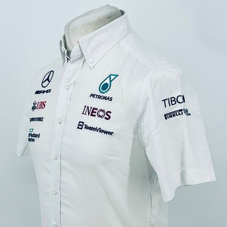 White team shirt with Petronas Ineos, TeamViewer, and TIBCO Pirelli sleeve logos