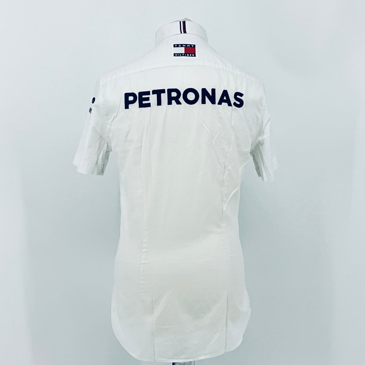 White team shirt back with PETRONAS text, short sleeves