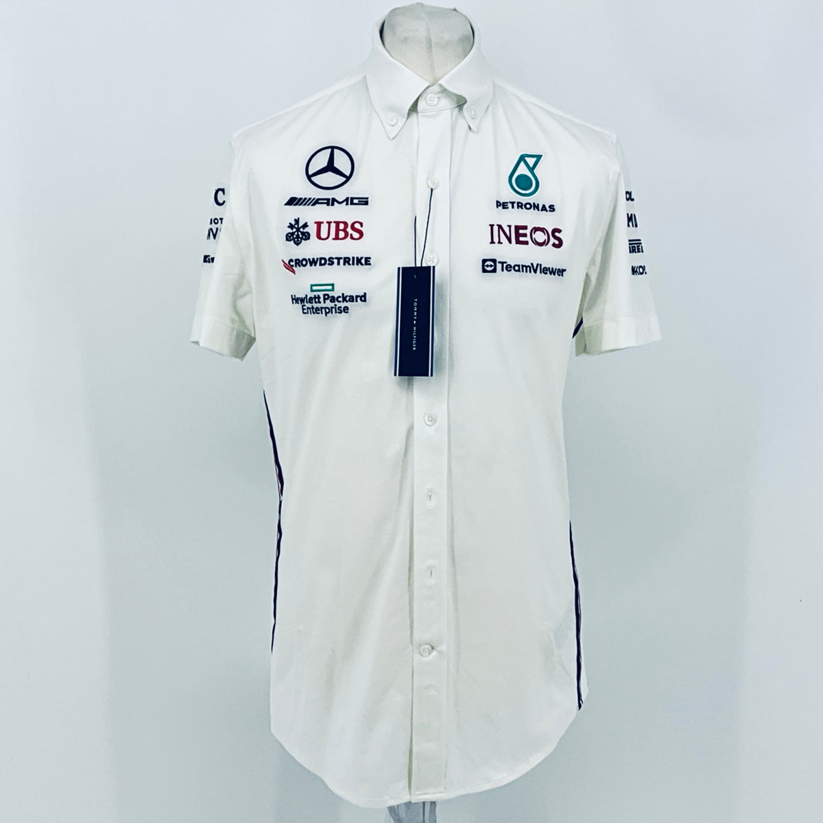 White short-sleeve team shirt with button front; Mercedes-AMG, UBS, INEOS and Petronas logos